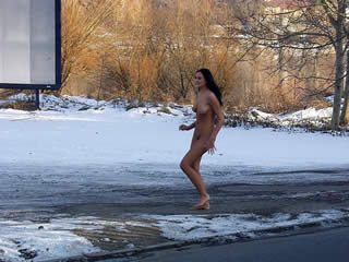 naked Russian girl Yana walks naked in winter